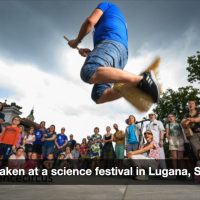 Picture of Magne in the air in Slovenia with an audience behind him.